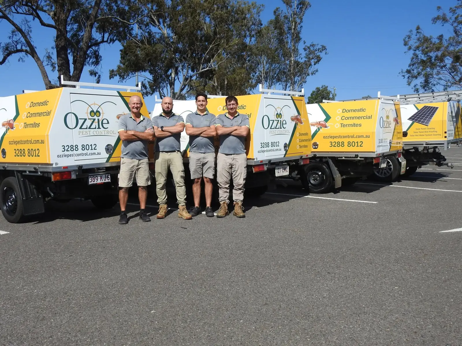 Darren Smith and the Ozzie Pest Control technicians with their fleet